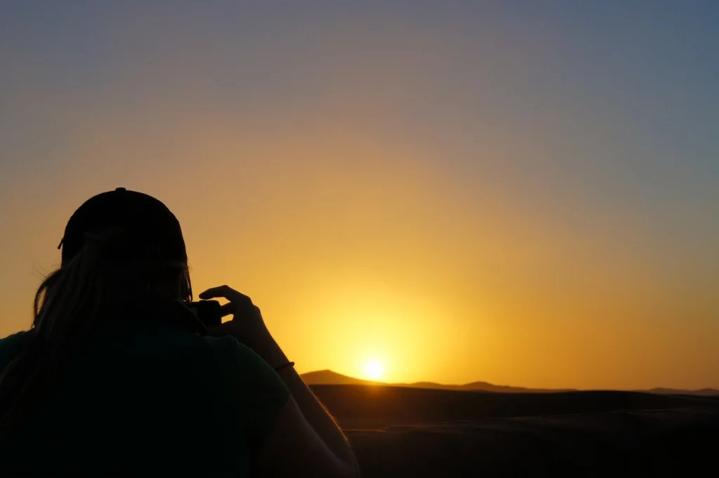 Climbing sand dunes in Morocco to get a photo of the sunset