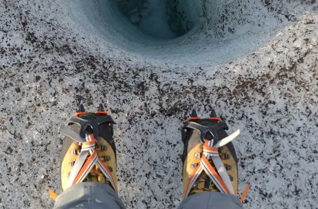 Walking boots with crampons in Iceland
