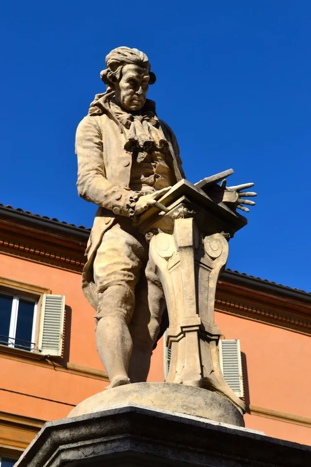 Statue reading in Bologna