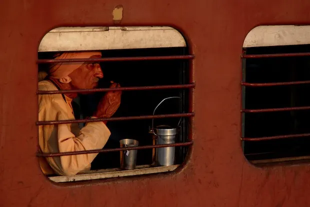 man on a train in India