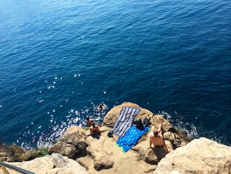 Sunbathing on rocks in Dubrovnik