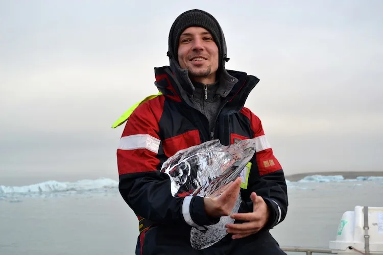 Icelandic man holding ice