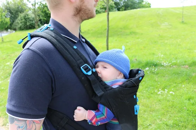 Baby in Pao Papoose baby carrier