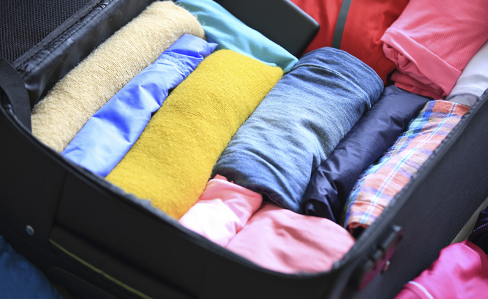 how to pack a suitcase and save space