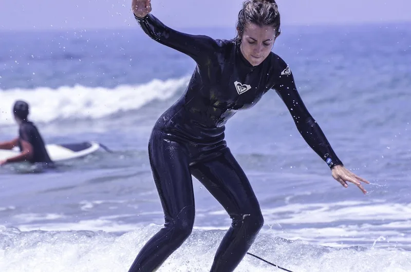 Learning to surf at Rapture Surfcamp Portugal