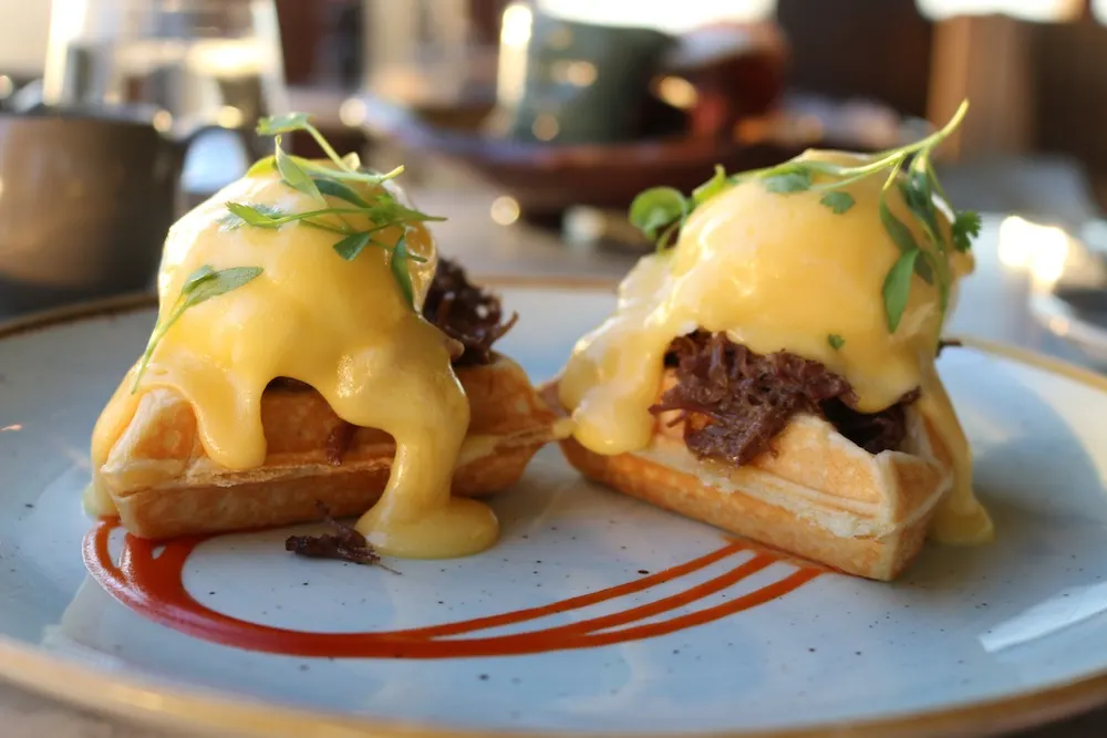 Duck and Waffle Ox Cheek benedict