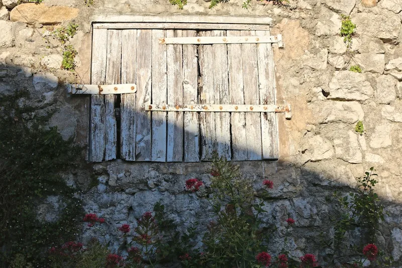 Rustic shutters in Balazuc