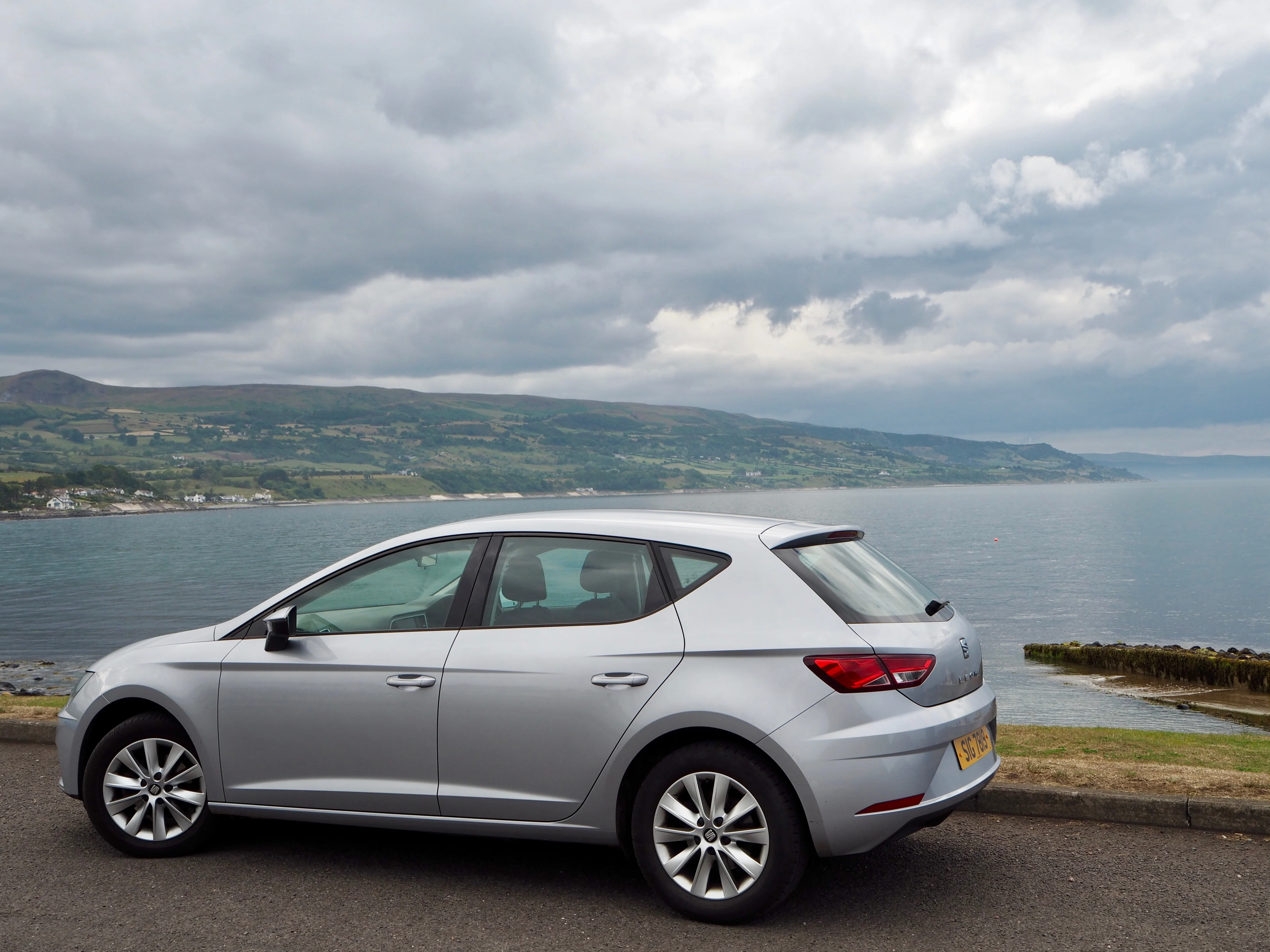 Silver car on Causeway Coast road - Beyond the City Break in Belfast with Flybe and Avis