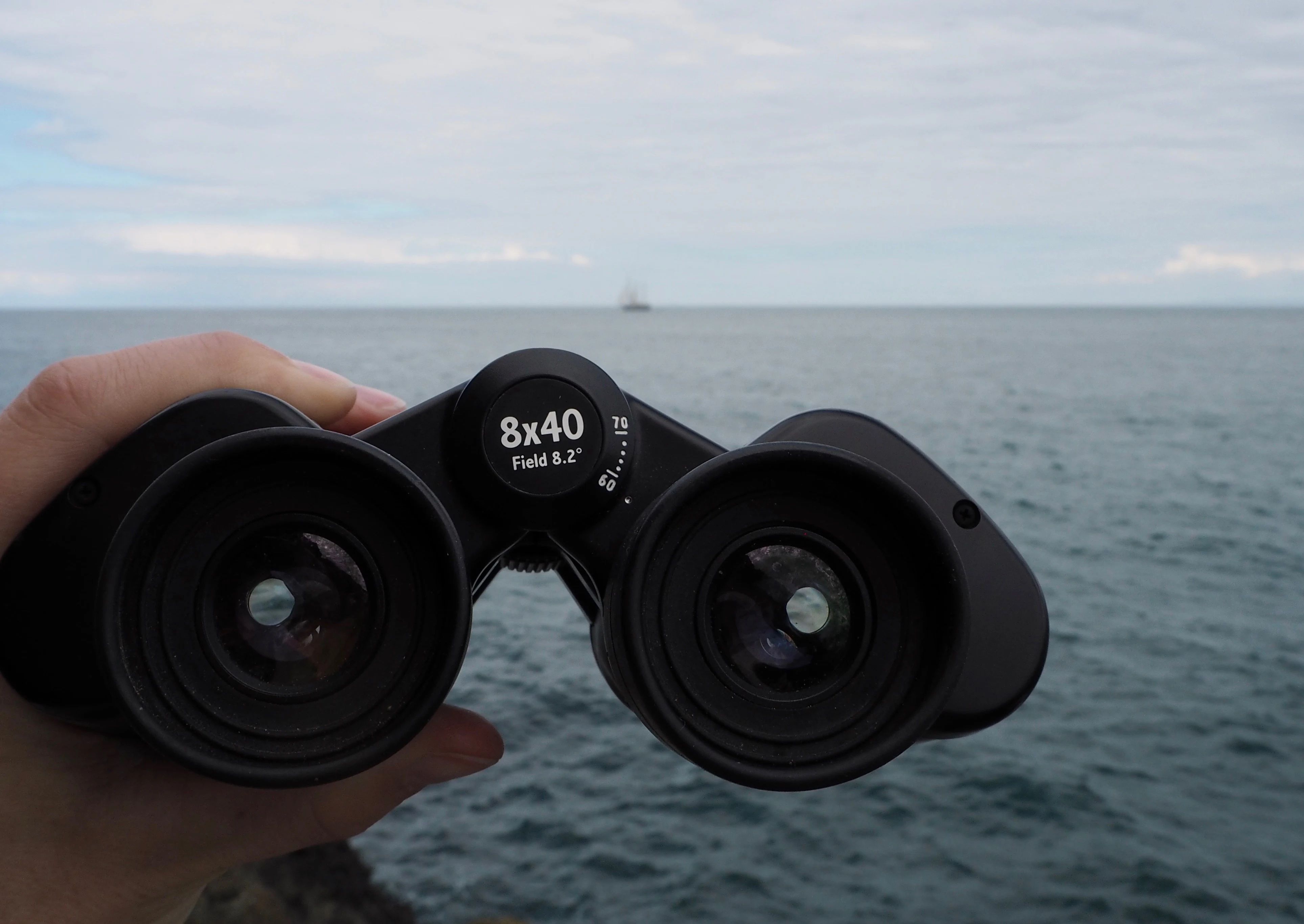 Hand holding binoculars - Beyond the City Break in Belfast with Flybe and Avis