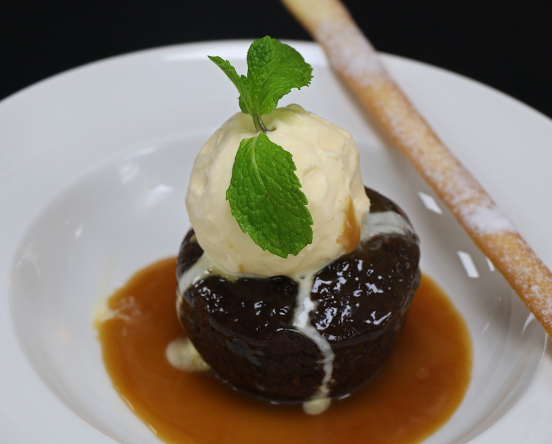 sticky toffee pudding with vanilla ice cream and caramel sauce