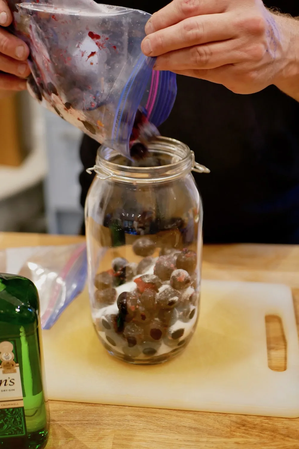 Making homemade damson gin