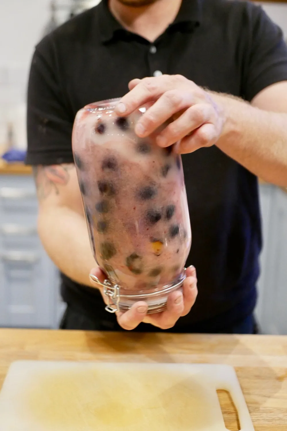 Making homemade damson gin