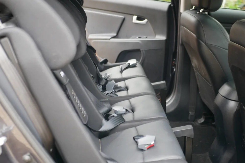 https://thetravelhack.com/wp-content/uploads/2021/09/How-to-fit-4-car-seats-in-a-car.jpg.webp