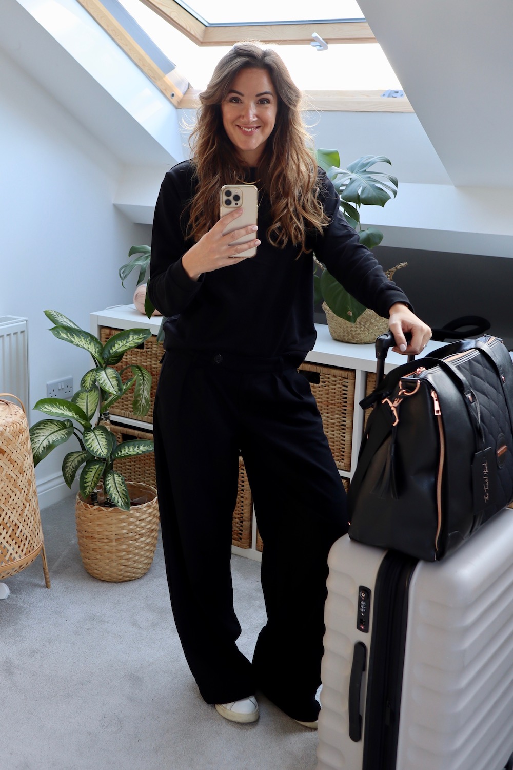Wide leg black trousers plane outfit