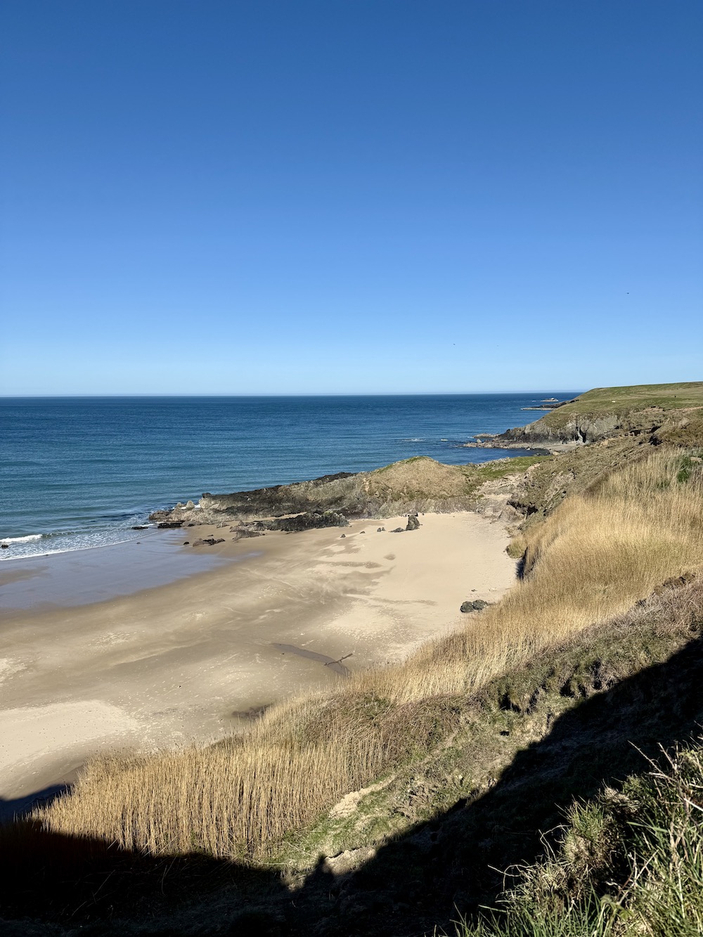 Quiet beach at Whistling Sands Beach Porthor